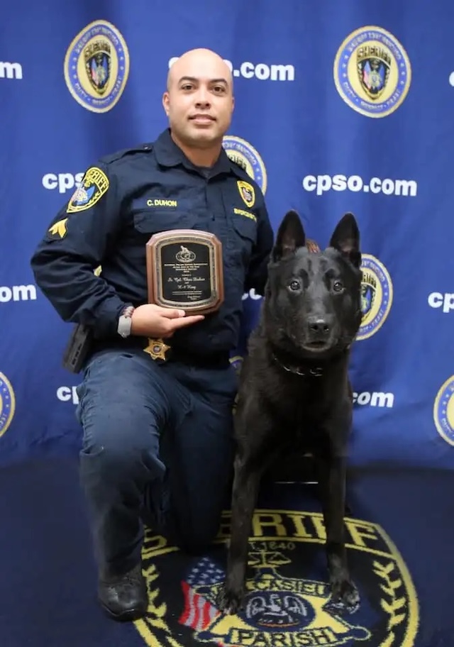 Officer C. Duhon and K9 King proudly showing their achievement together. A partnership built on trust and bravery