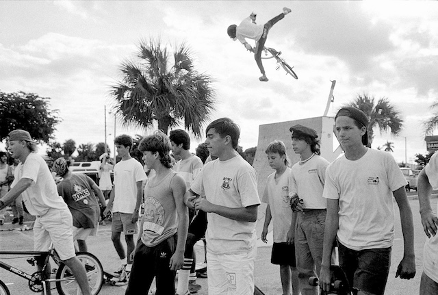 The thrill of youth, frozen in mid-air. Biking through endless summers, daring jumps that echo the carefree spirit of the time