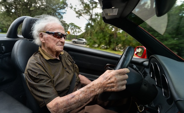 Gregory takes a ride in his brand-new sports car, a gift that symbolizes how generosity can come back in unexpected ways