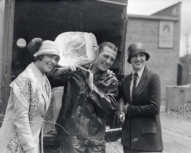 The ice man's daily grind didn't stop him from sharing a moment of joy with passersby