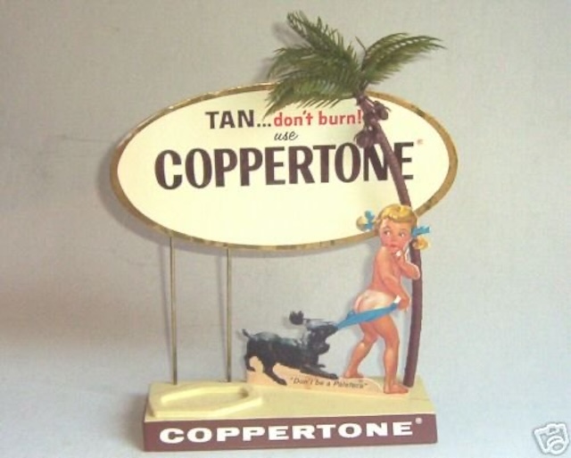 A Coppertone display, reminding us of the days when sunscreen advertisements were just as playful as they were practical