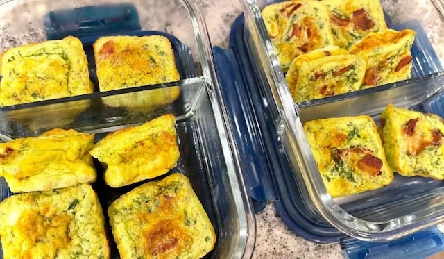 Frozen egg squares neatly stored in glass containers, ready for a quick reheat when needed