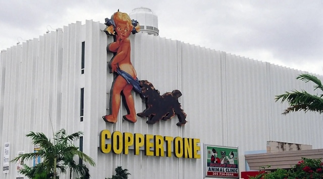 The famous Coppertone girl, larger-than-life, featured on a Miami building, solidifying her place in advertising history