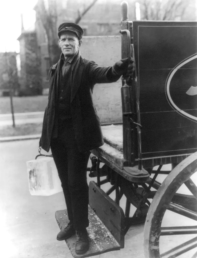 This man’s horse-drawn ice wagon was a common sight on early streets, bringing a touch of cold to warm homes