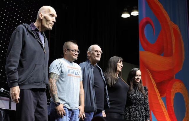 The cast members of "The Addams Family" strike a pose, giving fans a nostalgic glimpse into the beloved spooky family