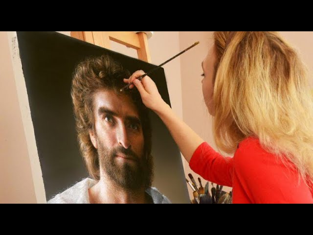 Akiane Kramarik working on her masterpiece "Prince of Peace," portraying Jesus as she saw Him in her dreams