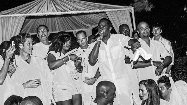 Sean "Diddy" Combs hosting one of his famous White Parties, where celebrities dressed in glamorous white attire were part of the lavish scene