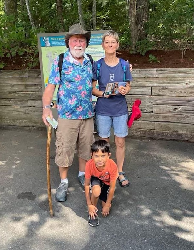 Micah pictured with his grandparents during happier times before Hurricane Helene changed everything