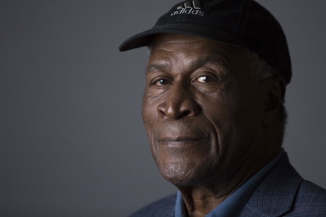 John Amos in a contemplative pose, showcasing the quiet strength that defined both his characters and real life