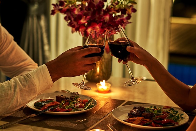 The couple initially set out to have a nice dinner, toasting to new beginnings—until the surprise arrival of the woman’s family members turned the night upside down