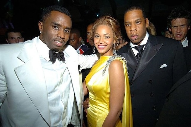 Throwback to Diddy, Beyoncé, and Jay-Z making an appearance together at a glamorous event, representing their undeniable status as music royalty