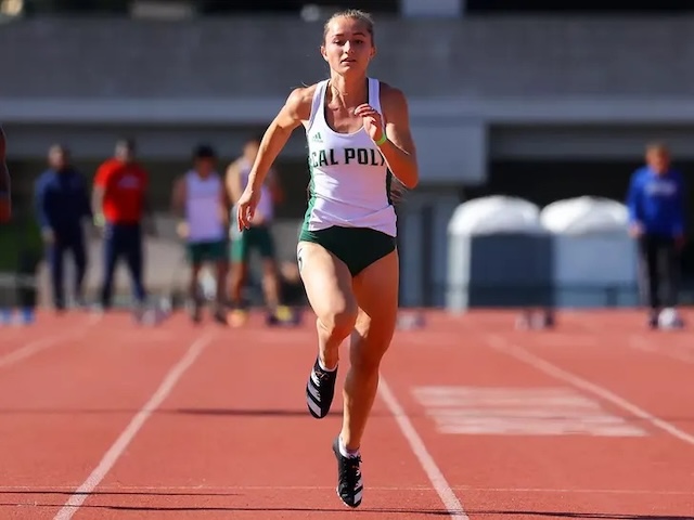 Shelby Daniele in action during a track meet, showcasing her strength and athleticism as a standout runner for Cal Poly