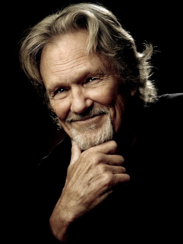 A warm portrait of Kris Kristofferson, his signature beard and smile conveying the wisdom and kindness he carried throughout his life