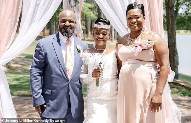 Miracle standing with her proud parents, Kareem Phillips and Tamika Phillips, on her wedding day, celebrating her union with Charles