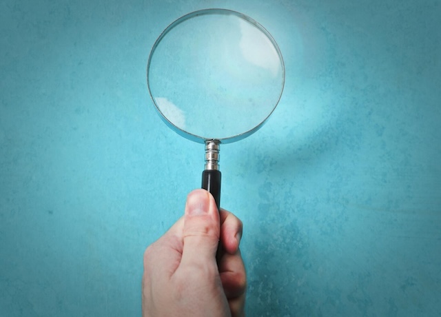 A magnifying glass, symbolizing the importance of keen observation and attention to detail in solving visual puzzles