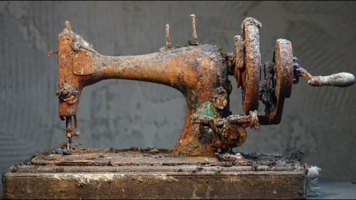 Once a proud tool of productivity, this 1894 Singer sewing machine was left to the ravages of time, with rust and corrosion taking over its once-glossy frame.