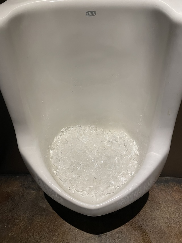 By adding ice to urinals, establishments can save water and reduce the effort needed for cleaning