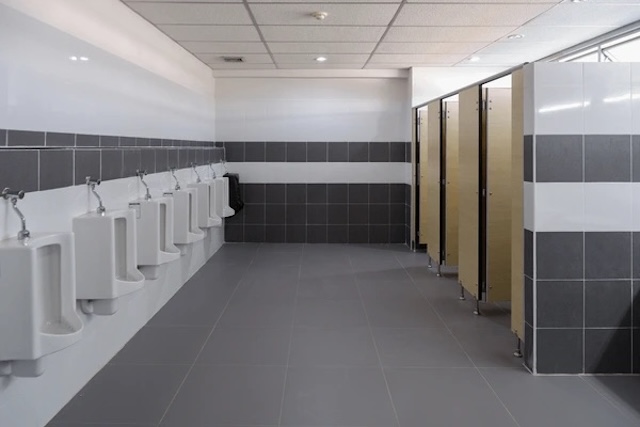 The raised stall doors might be standard, but they play an important role in public restroom efficiency