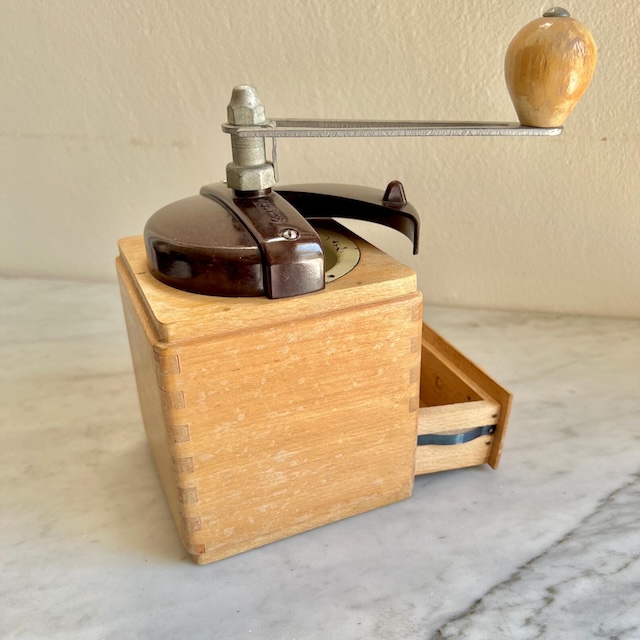 This wooden coffee grinder brings back memories of simpler times. Imagine starting your day with the satisfying sound of beans being ground by hand