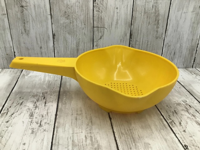 This iconic yellow plastic strainer was a staple in every household back in the day, known for its durability and functionality