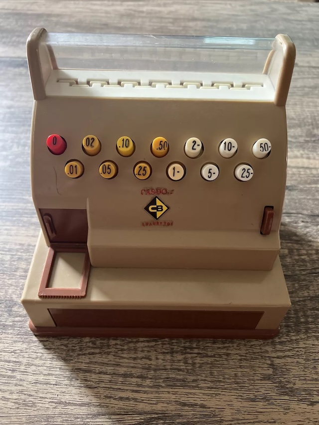 Another angle of the iconic Casdon toy cash register, featuring its colorful buttons and realistic design