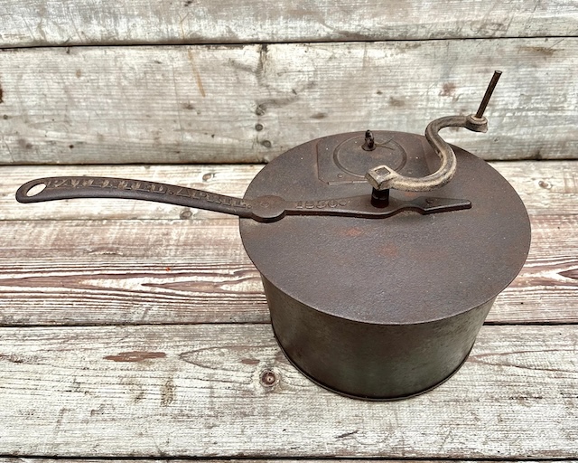 The rustic, durable construction of this antique coffee roaster adds charm to any collection of vintage kitchenware