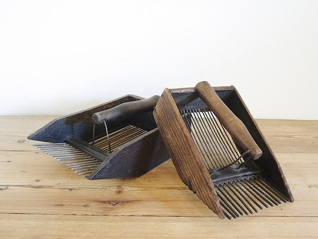 These wooden berry scoops were essential during berry harvests long before modern gadget