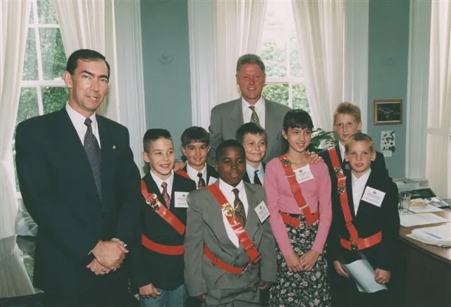 A proud moment for these young leaders, wearing their school safety patrol belts as they meet President Bill Clinton