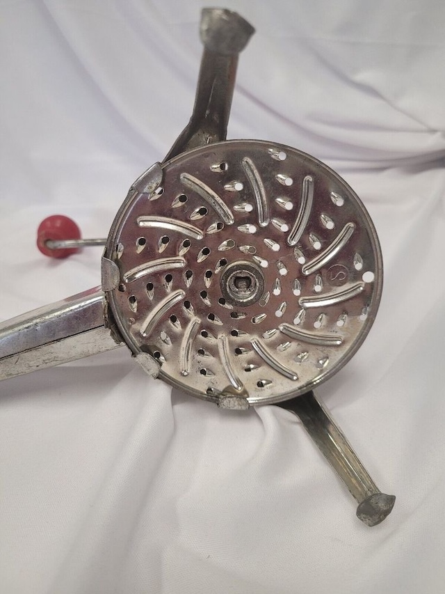 This old Mouli grater features various grating discs, providing different textures for any recipe. It was the go-to grater for everything from fine Parmesan to hearty potatoes