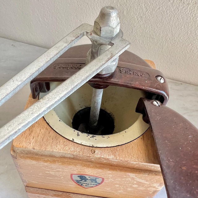 The internal mechanics of this old coffee grinder – proof of the intricate design that made it a must-have kitchen tool back in the day