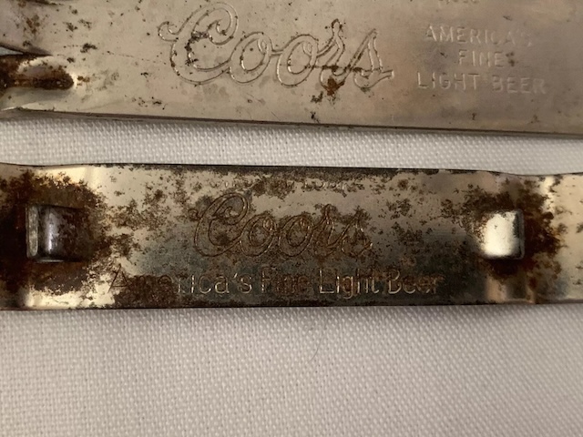 Even with the signs of rust, the vintage Coors bottle opener holds memories for those who enjoyed America's fine light beer