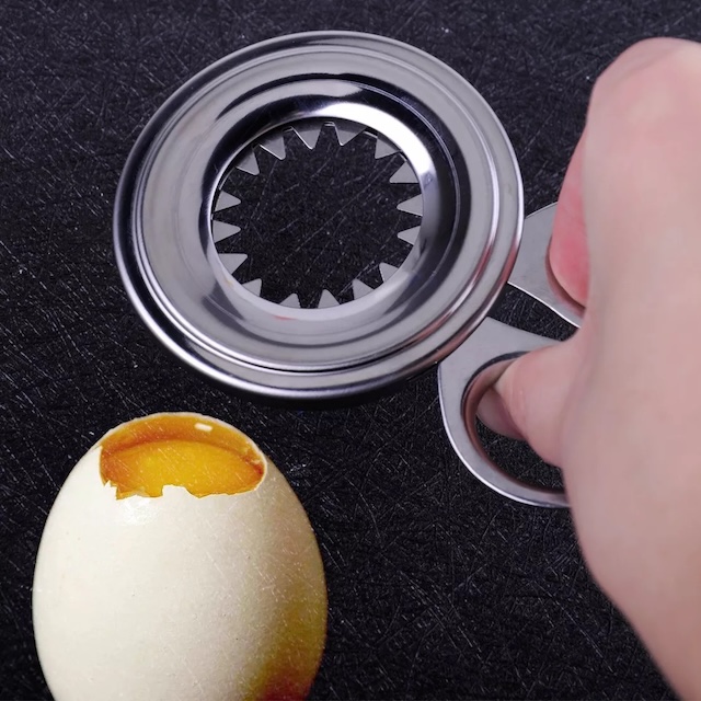 With a gentle squeeze, the egg topper neatly cuts through the shell, making it a favorite for breakfast enthusiasts