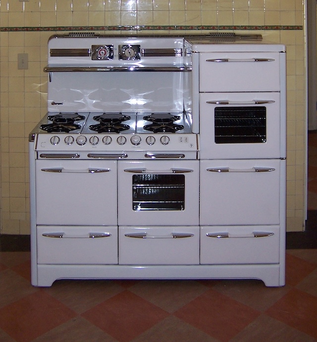 This vintage gas stove was the heart of the home, where meals were crafted and stories were shared, capturing the nostalgia of simpler times