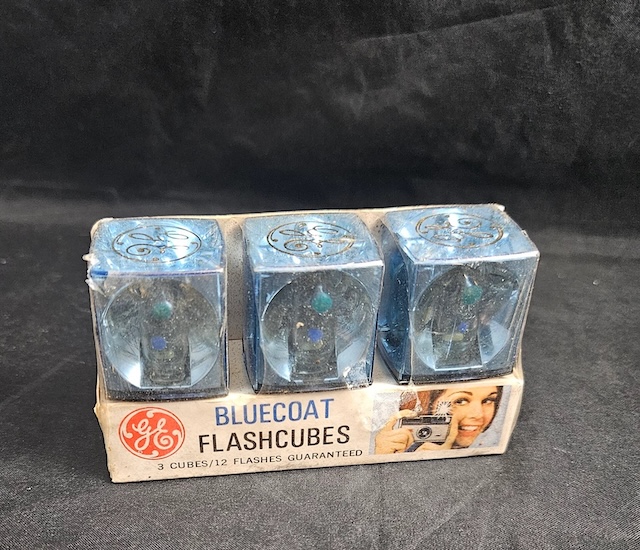 Still in its original packaging, a set of pristine GE Americana Flash Cubes, promising 12 bright flashes with each cube for vibrant memories