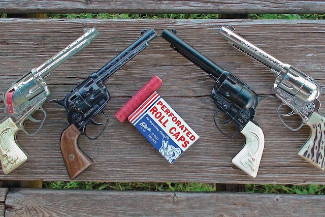 Three of the most cherished childhood companions—the classic cap guns with their trusty roll caps. Do they bring back memories of your wild-west showdowns?