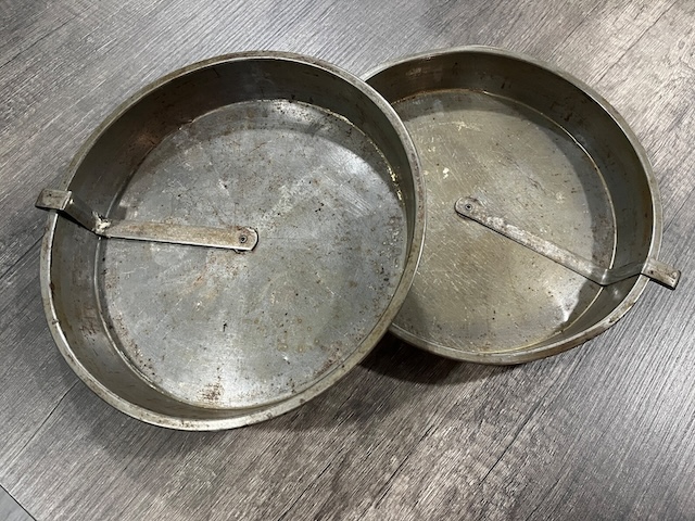 A classic "Bake King" model of the vintage slider cake pan, emphasizing the brand that was well-known for durable and efficient baking tools