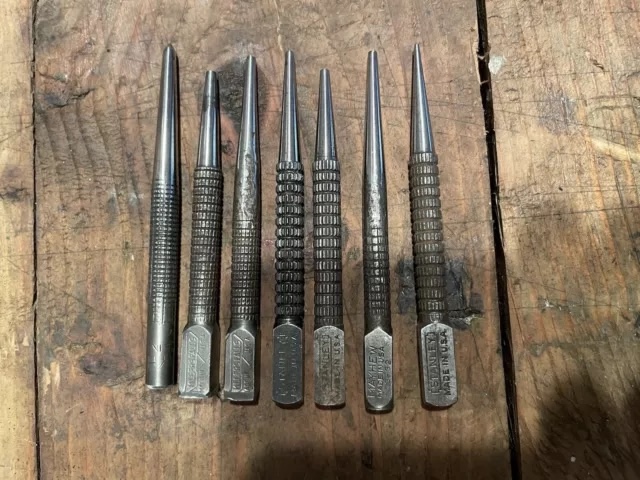 A well-used collection of vintage nail punches, designed for precision work, now an antique treasure for collectors