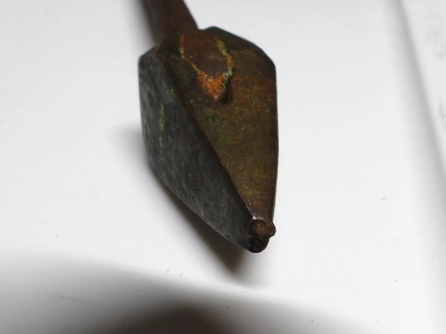 Close-up of the worn tip on a vintage soldering iron, still capable of joining metals