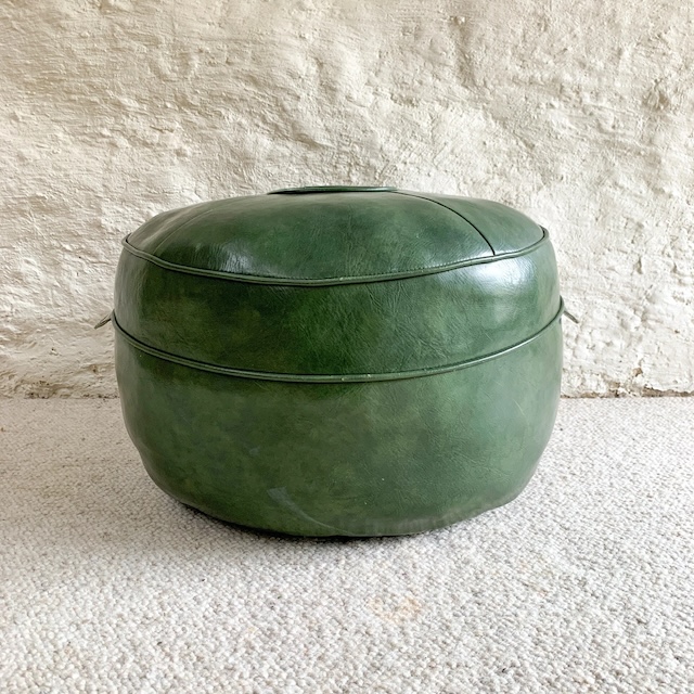 A timeless piece of furniture, this vintage green ottoman pouffe is both functional and stylish. Who else remembers having one of these at home?