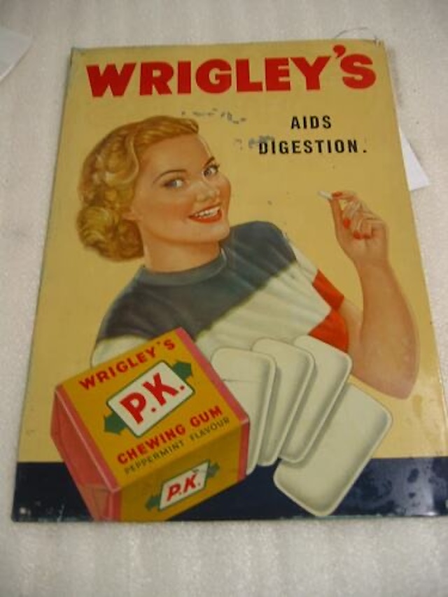 Vintage advertisement for Wrigley's P.K. Gum, emphasizing its aid in digestion and timeless appeal