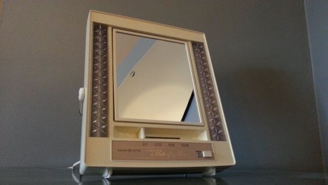 Elegant and timeless: a vintage lighted makeup mirror that was once a staple on every vanity