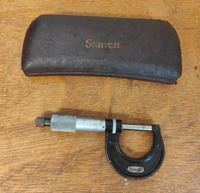 A vintage Starrett micrometer, complete with its original leather case, demonstrating the durability and longevity of these timeless tools