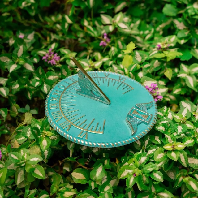 Standing tall on its own, this slender sundial reminds us of the simplicity of ancient timekeeping, a functional piece of history now cherished as a decorative artifact