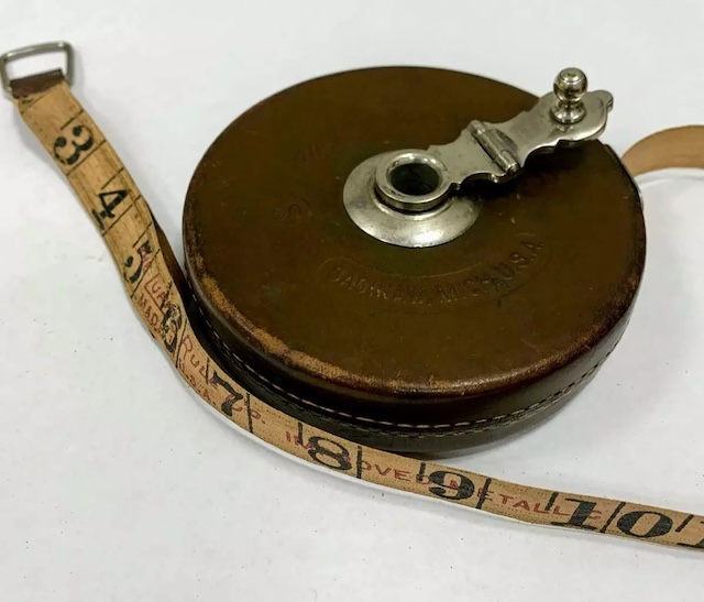 A look at the full glory of a vintage Lufkin rule, with its retractable tape measure still intact. A piece that stood the test of time, bringing precision to every measurement