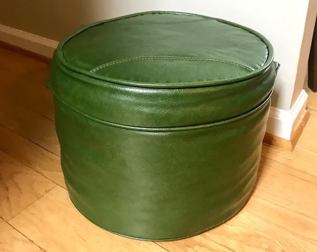 The tufted design of this vintage green ottoman pouffe adds an extra touch of class to its look. Comfortable and durable, it was an essential piece of home decor back in the day