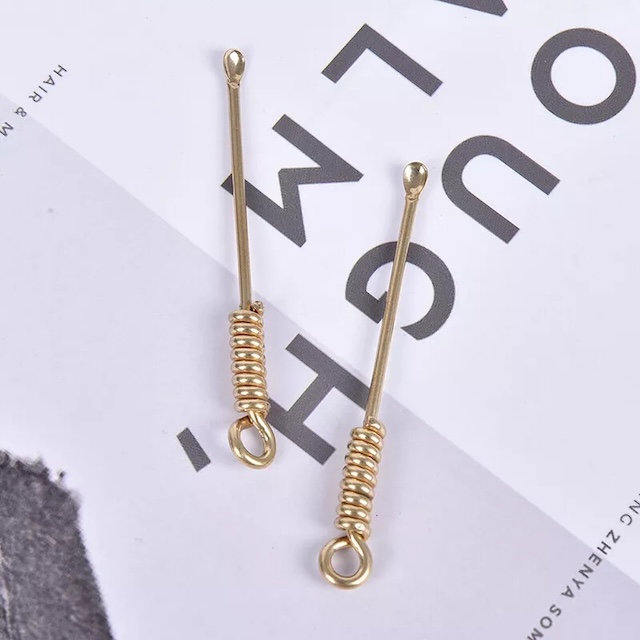 These coiled-handle earwax removers offer both utility and an element of sophistication in their design, a fine example of practical craftsmanship