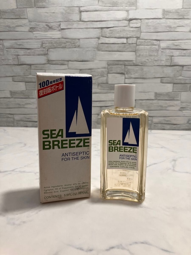 The iconic Sea Breeze bottle with its sailboat logo, reminding us of a product that was synonymous with clean, refreshed skin for decades