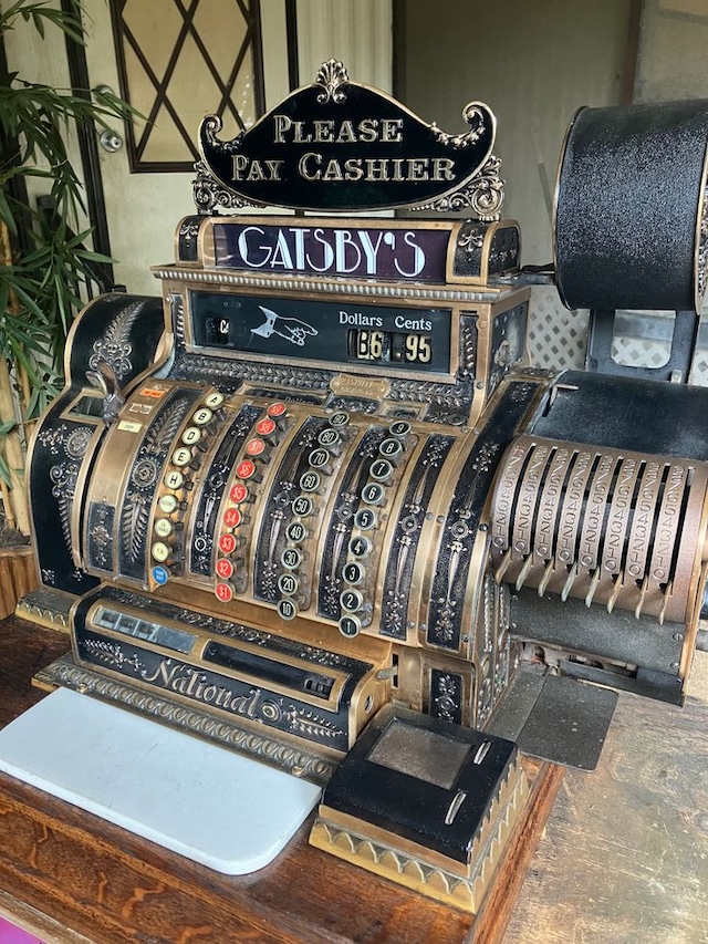 With its rich history and detailed engravings, this vintage mechanical cash register is a striking piece of craftsmanship, representing the time when cash registers were both functional and decorative