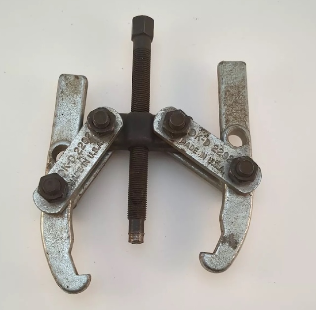 An up-close view of this well-worn gear puller shows the craftsmanship that went into tools like these, designed to last a lifetime and withstand heavy use