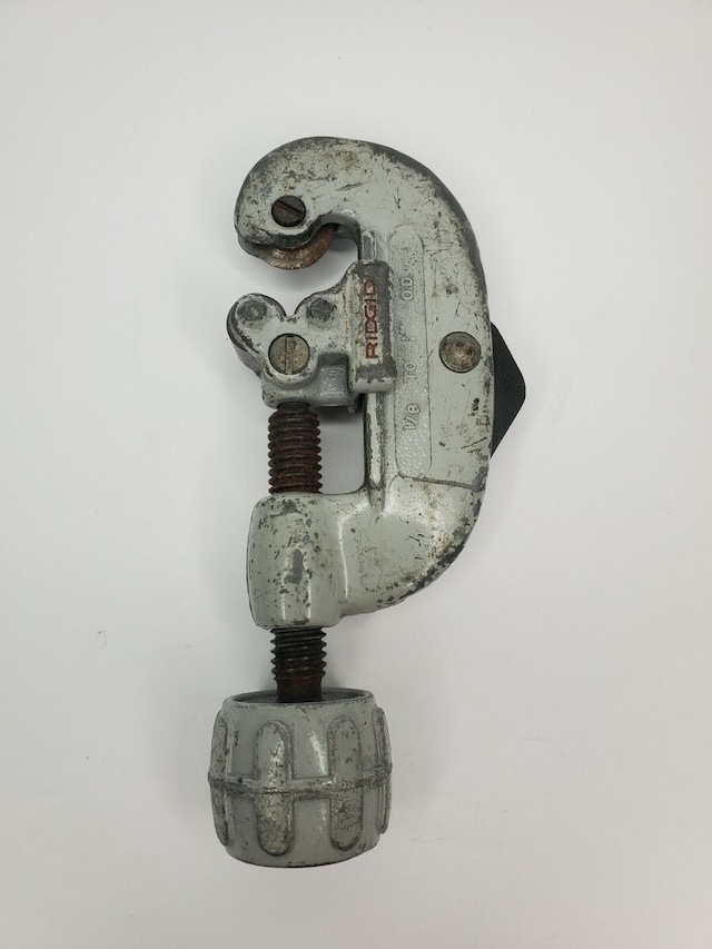 This old-fashioned pipe cutter may look simple, but it was vital for clean, precise cuts when installing or repairing pipes